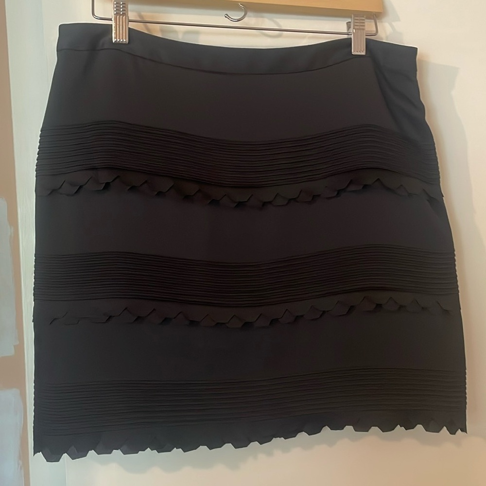 Banana Republic Black mini skirt with pleated and scallop detail. Size 12.